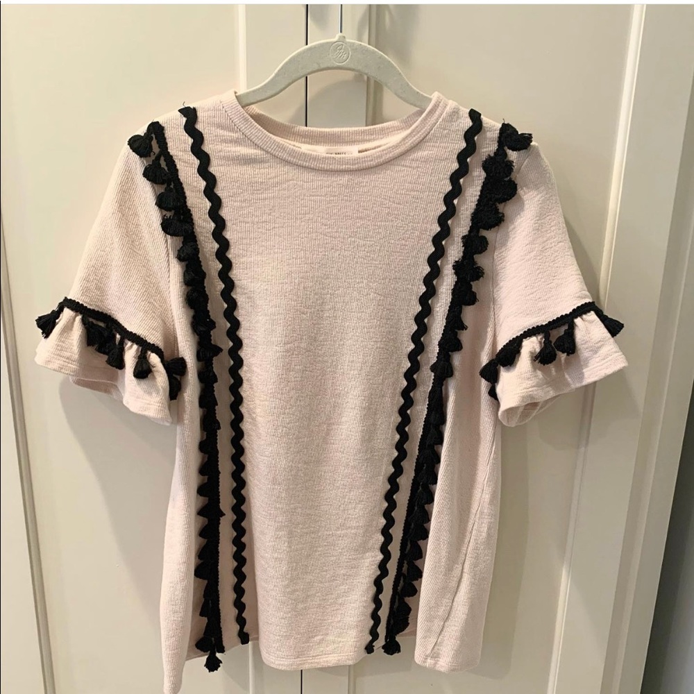 Free the Roses top